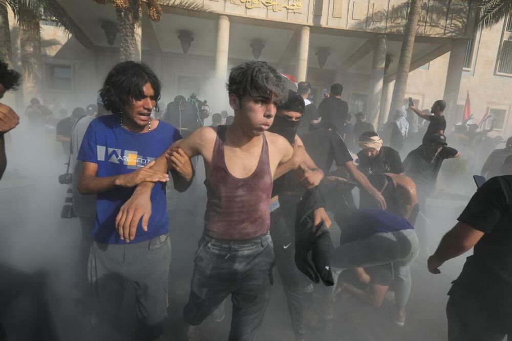 Supporters storm Republican Palace after Iraqi Shiite cleric Moqtada al-Sadr announced retirement from politics  / AHMED JALIL